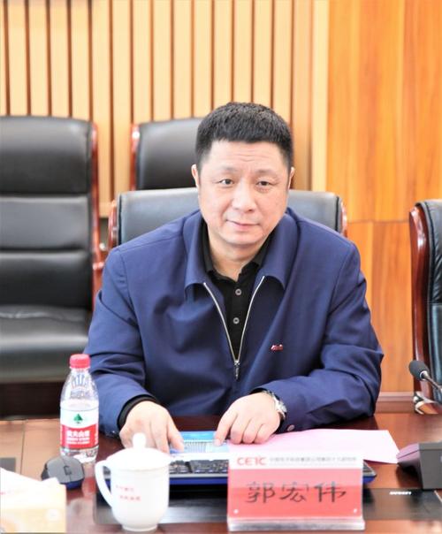 哈尔滨联通党委书记,总经理张新忠一行到49所洽谈交流